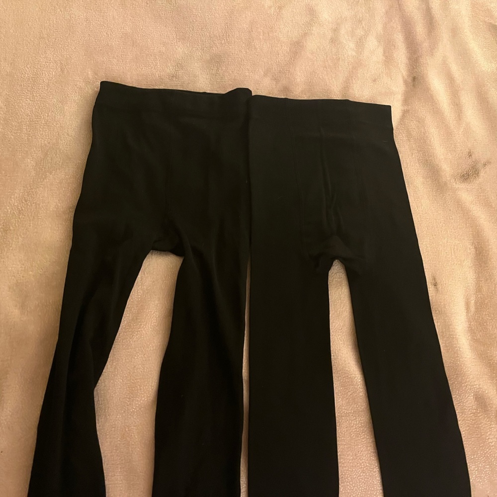 Pair of small black fleece lined leggings